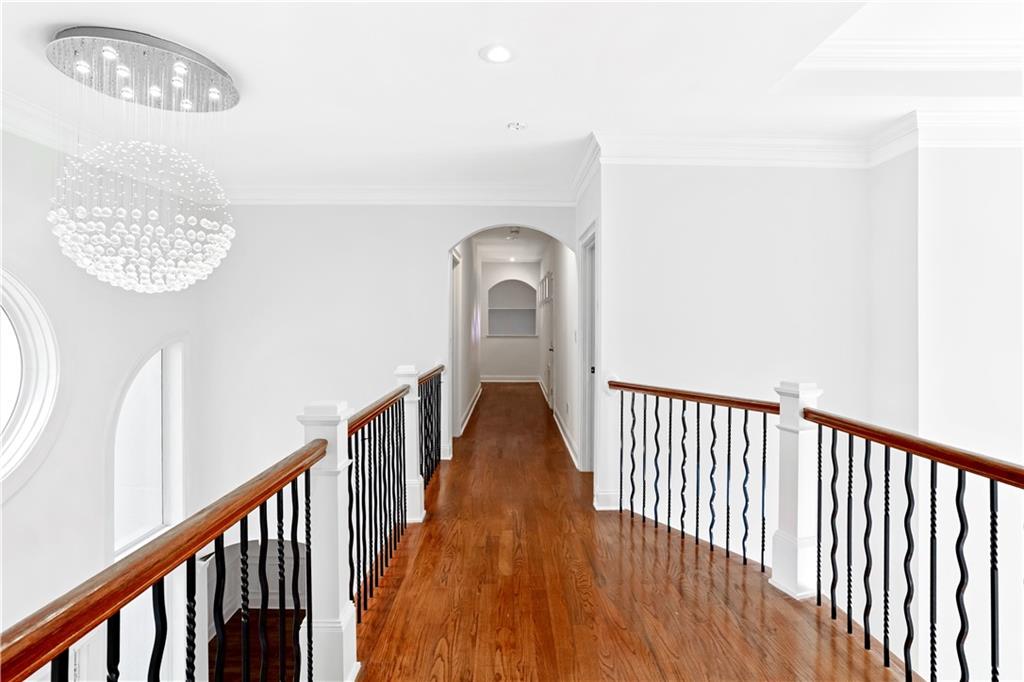 105 Ensley Point Fayetteville, GA 30214 - Photo 23 of 37 a view of a hallway with wooden floor