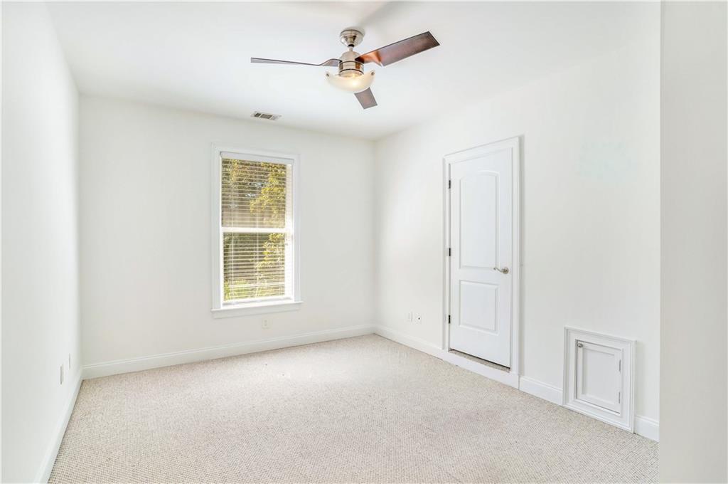 105 Ensley Point Fayetteville, GA 30214 - Photo 24 of 37 a view of an empty room with a window