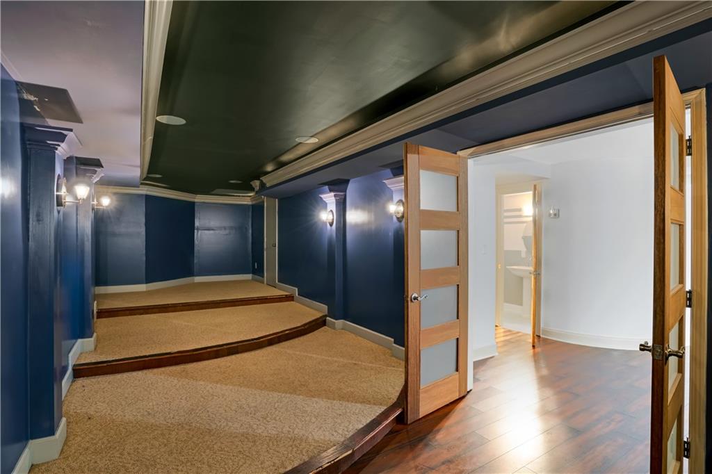 105 Ensley Point Fayetteville, GA 30214 - Photo 30 of 37 a spacious bathroom with a mirror and a shower