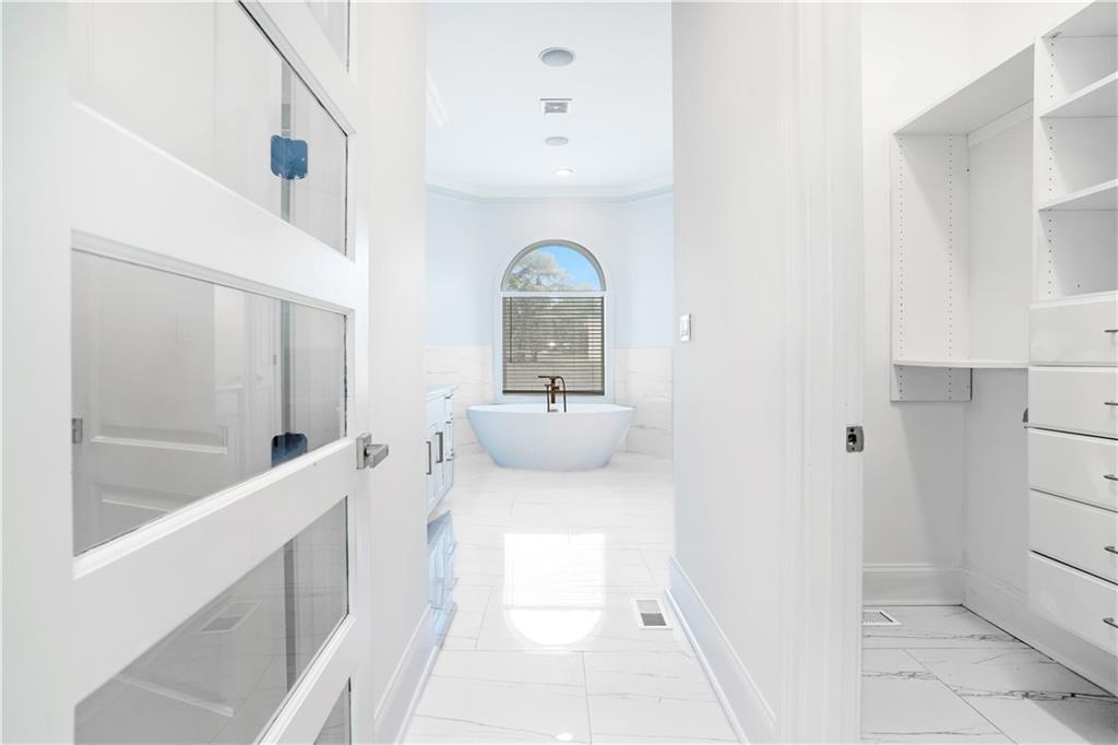 105 Ensley Point Fayetteville, GA 30214 - Photo 6 of 37 a bathroom with a sink a toilet and shower