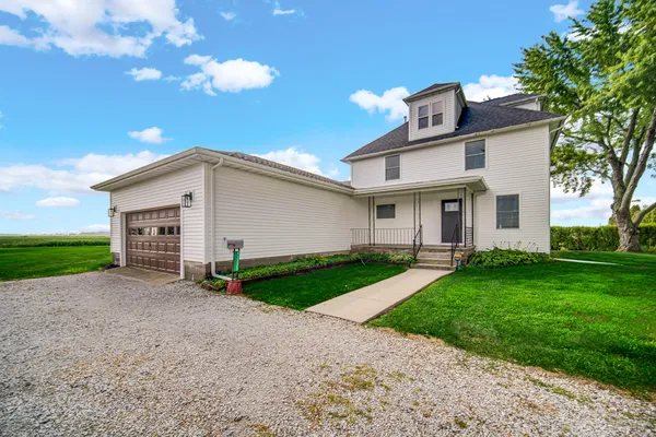 a view of a yard with a house