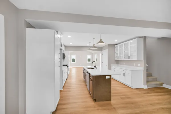 a view of kitchen with wooden floor