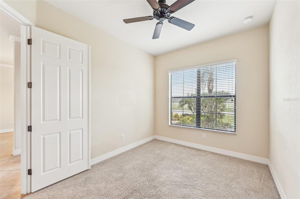 20345 Reale Circle Venice, FL 34293 - Photo 22 of 80 an empty room with windows and closet