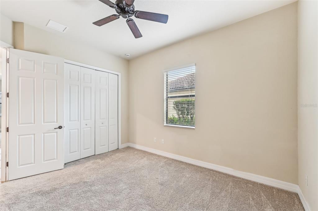 20345 Reale Circle Venice, FL 34293 - Photo 27 of 80 a view of an empty room with a window