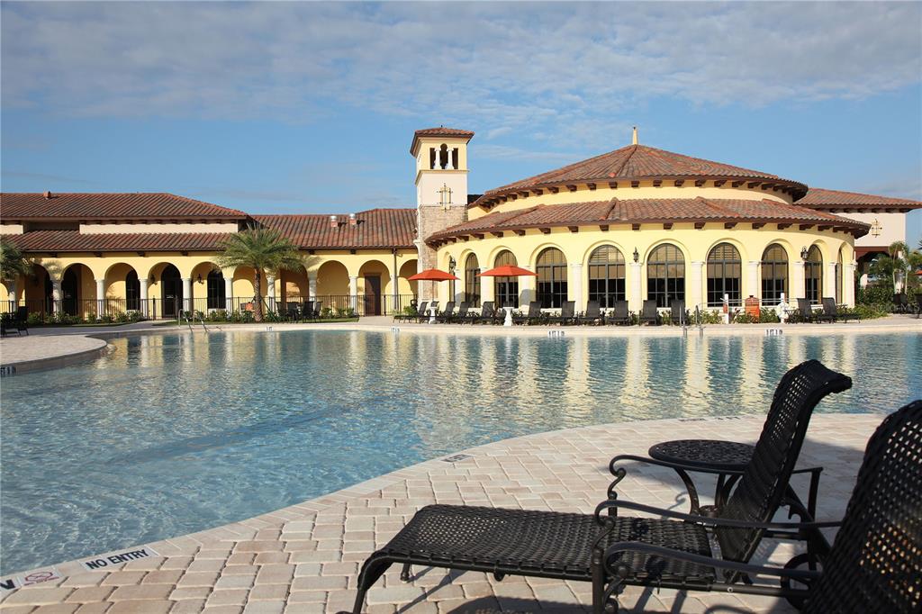 20345 Reale Circle Venice, FL 34293 - Photo 3 of 80 a view of a lake with sitting area