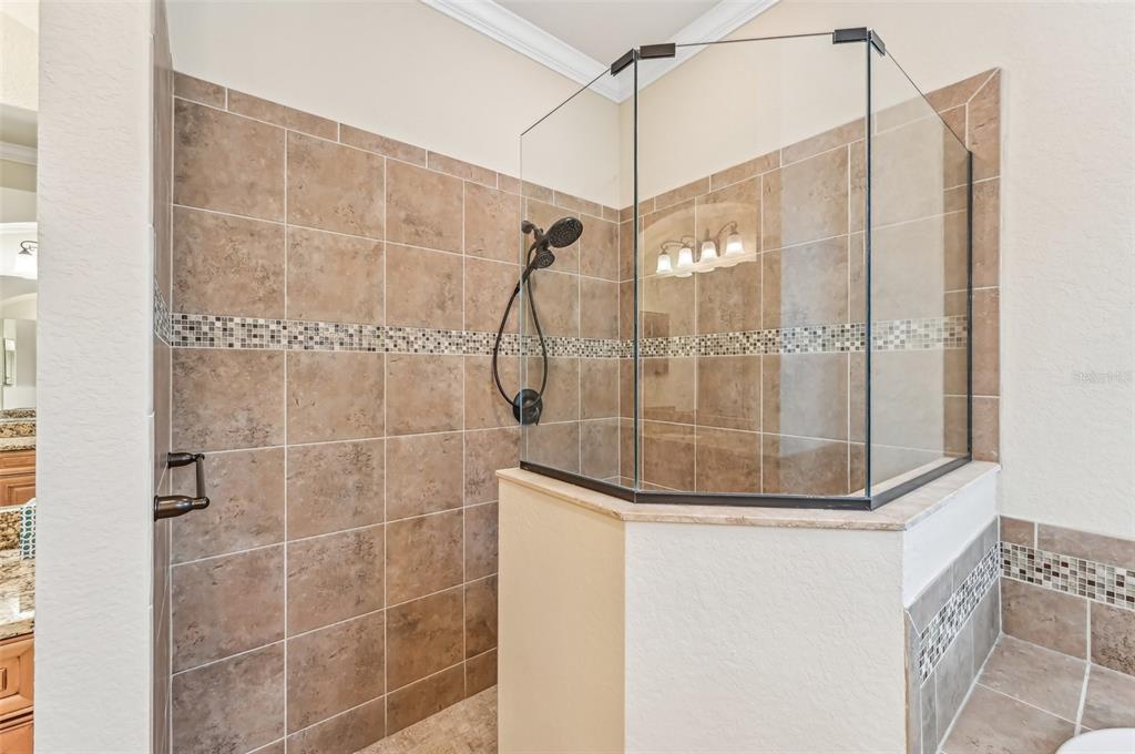 20345 Reale Circle Venice, FL 34293 - Photo 44 of 80 a bathroom with a shower