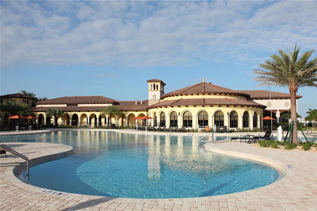 20345 Reale Circle Venice, FL 34293 - Photo 72 of 80 a view of a swimming pool with an outdoor seating