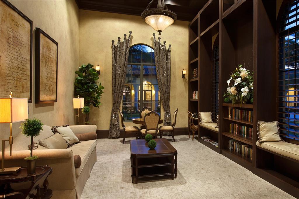 20345 Reale Circle Venice, FL 34293 - Photo 75 of 80 a living room with furniture and a large mirror