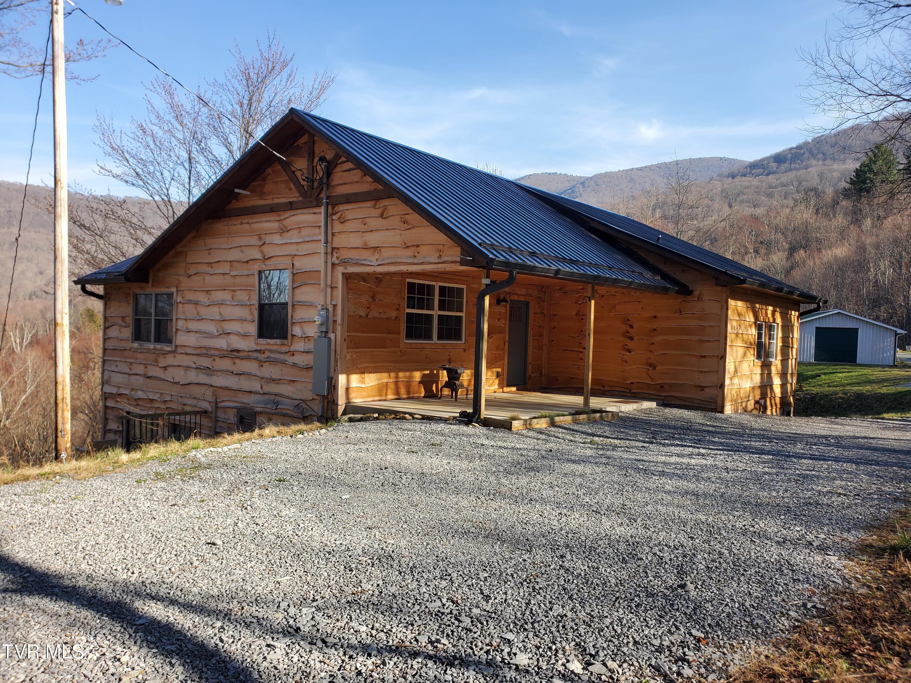 108 Roan Vw Road Roan Mountain, TN 37687 - Photo 1 of 35 20260329_173610
