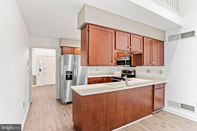 a bathroom with a shower and a sink