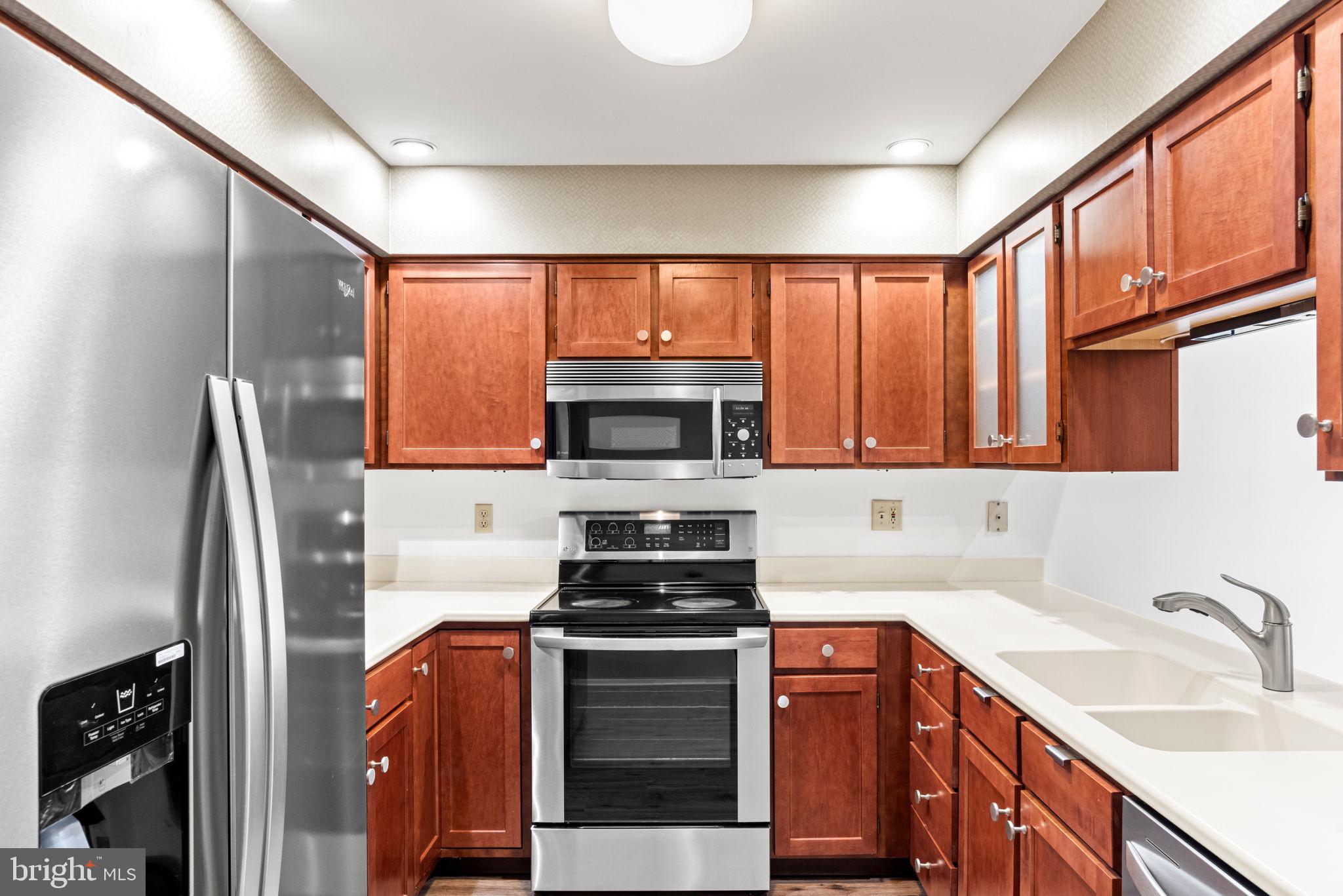 72 Leearden Road Hershey, PA 17033 - Photo 18 of 53 a kitchen with stainless steel appliances granite countertop a refrigerator and a sink