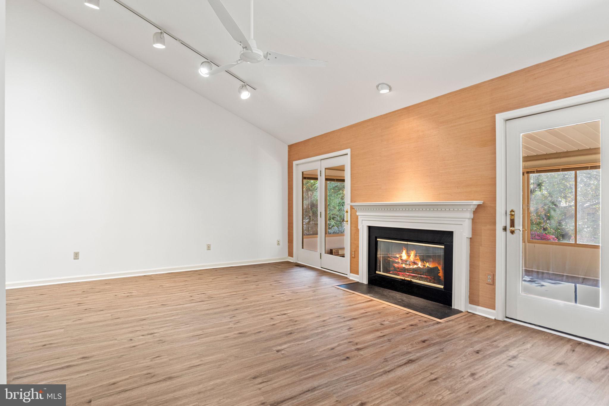 72 Leearden Road Hershey, PA 17033 - Photo 20 of 53 a view of an empty room with wooden floor fireplace and a window