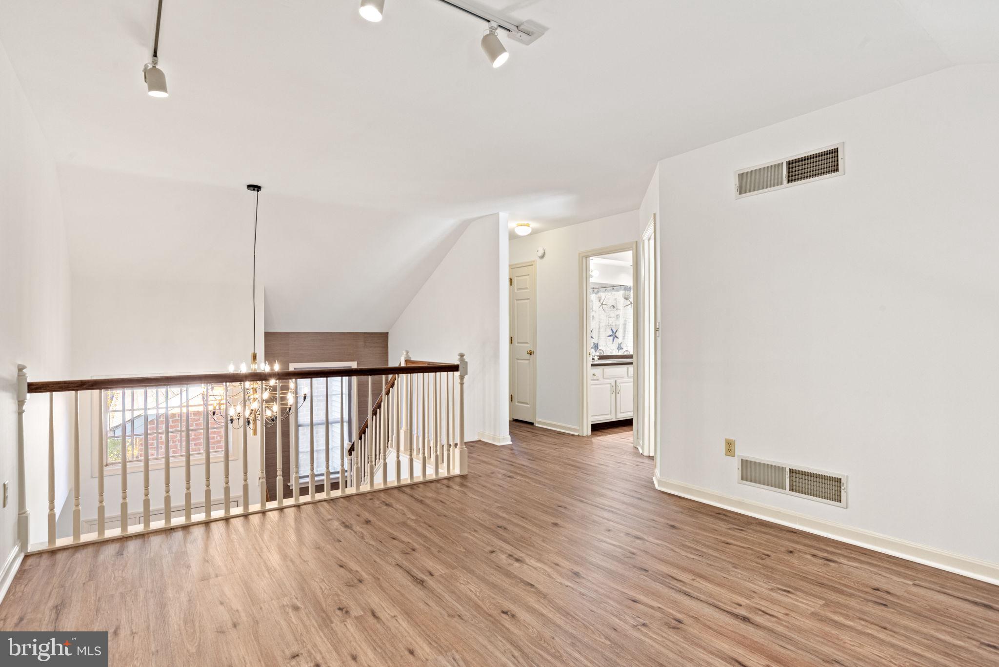 72 Leearden Road Hershey, PA 17033 - Photo 38 of 53 a view of a hallway with wooden floor
