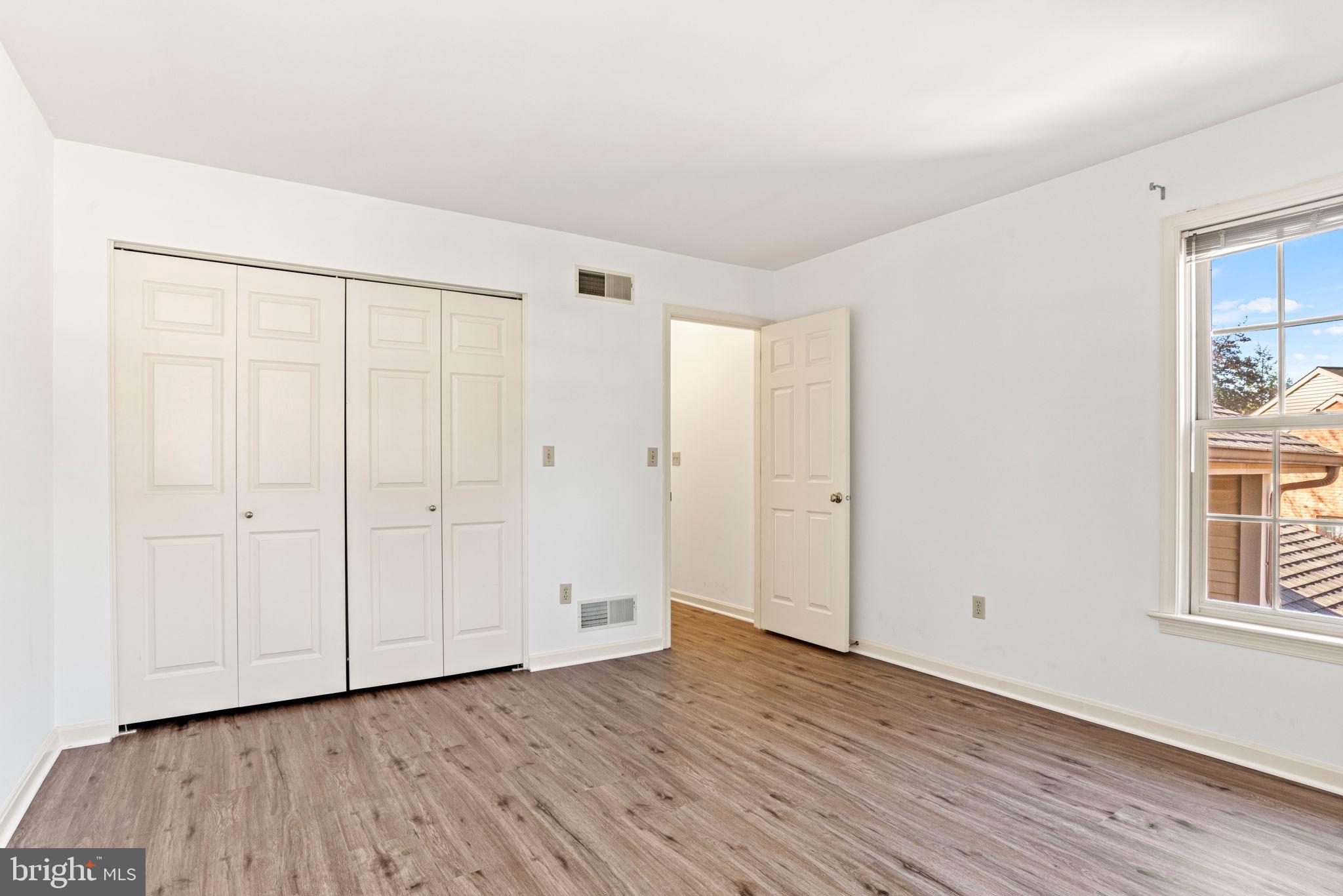 72 Leearden Road Hershey, PA 17033 - Photo 45 of 53 a view of an empty room with wooden floor and a window