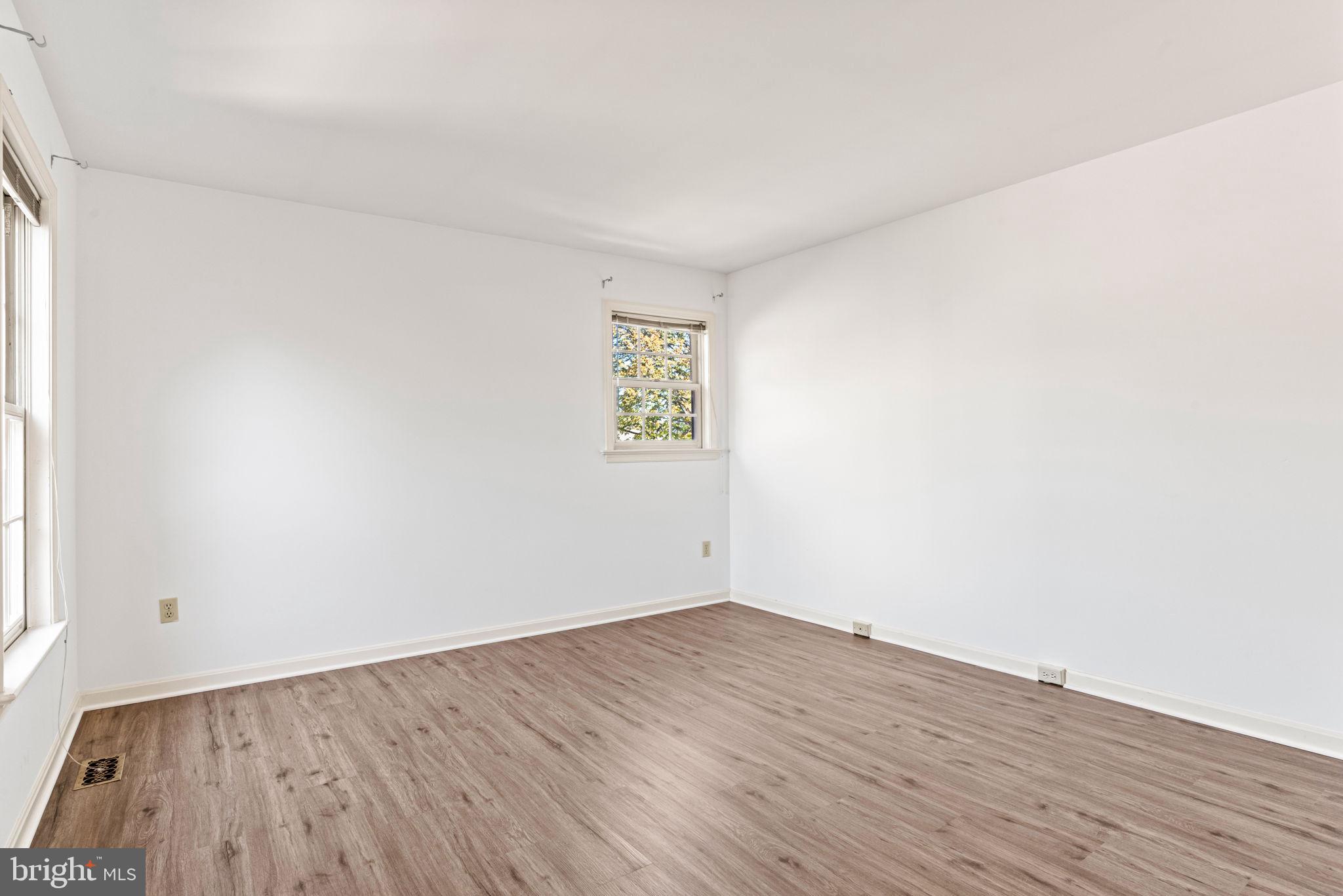 72 Leearden Road Hershey, PA 17033 - Photo 46 of 53 an empty room with wooden floor and windows