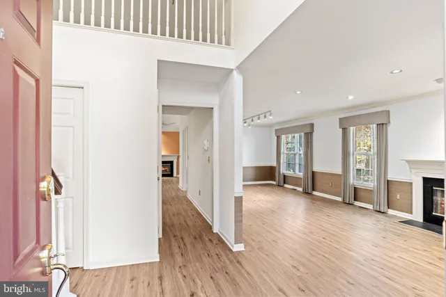 a view of entryway with wooden floor