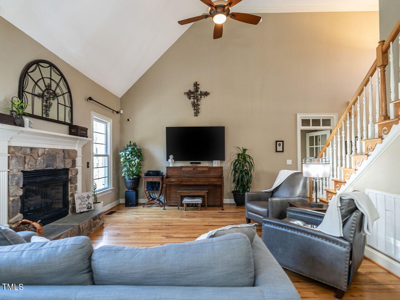 1173 Smith Creek Way Wake Forest, NC 27587 - Photo 11 of 42 a living room with furniture and a fireplace
