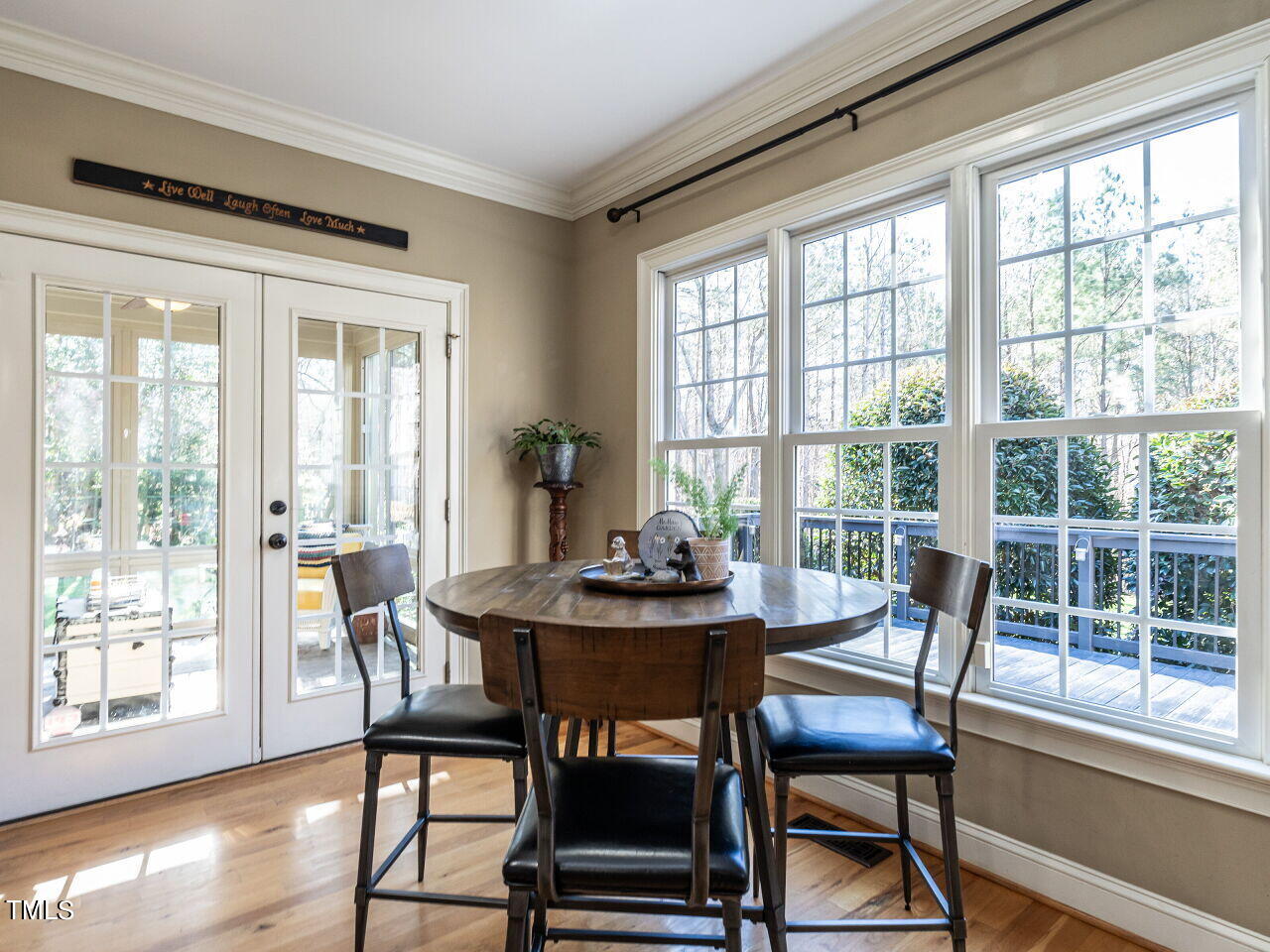 1173 Smith Creek Way Wake Forest, NC 27587 - Photo 12 of 42 a dining room with furniture window and wooden floor