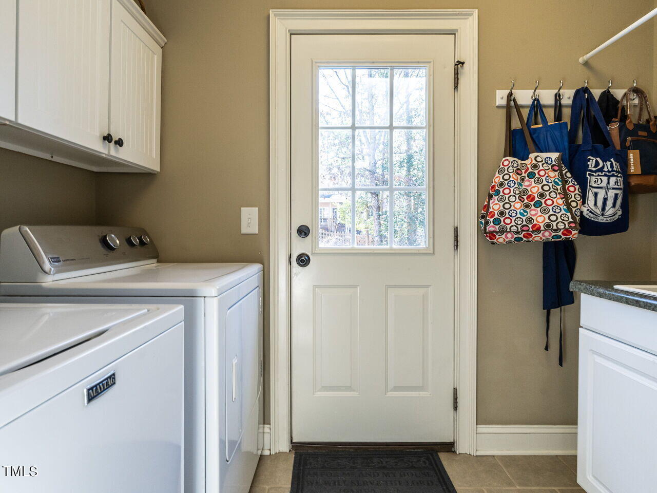 1173 Smith Creek Way Wake Forest, NC 27587 - Photo 19 of 42 a utility room with dryer and washer