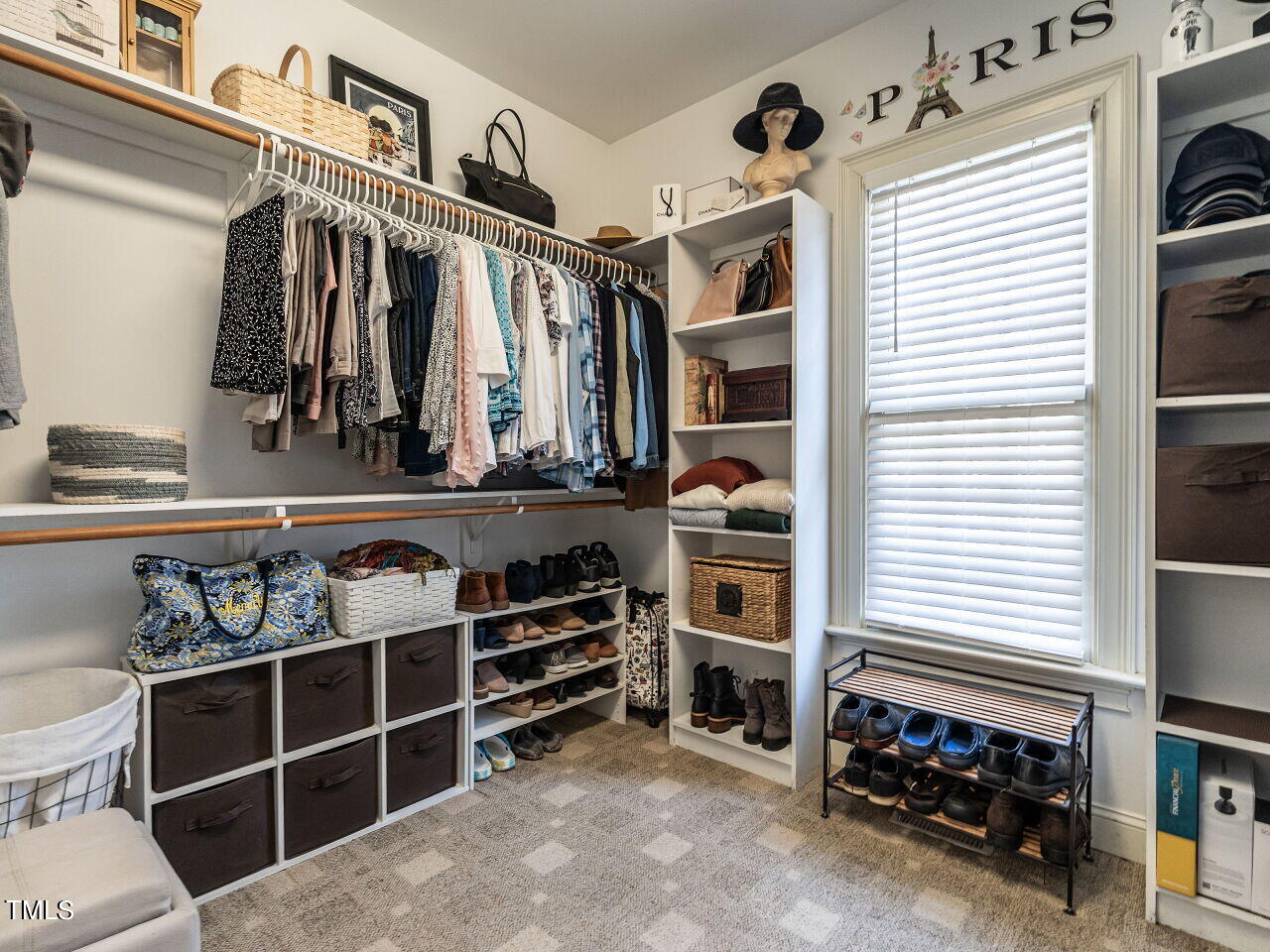 1173 Smith Creek Way Wake Forest, NC 27587 - Photo 24 of 42 a view of walk in closet with clothes and shoes