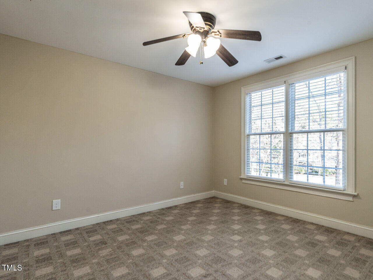 1173 Smith Creek Way Wake Forest, NC 27587 - Photo 26 of 42 a view of an empty room with a window