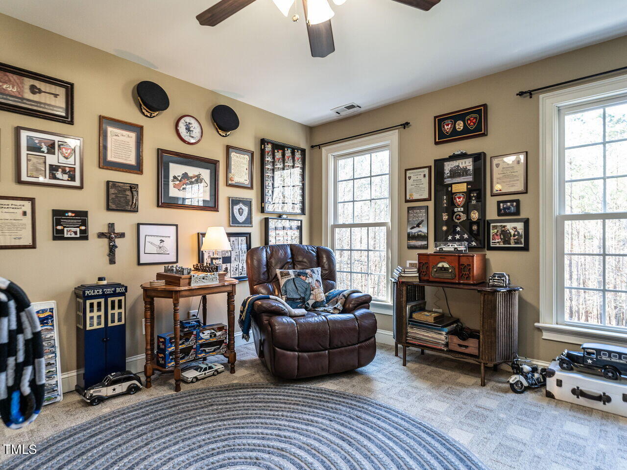 1173 Smith Creek Way Wake Forest, NC 27587 - Photo 28 of 42 a living room with furniture and a window