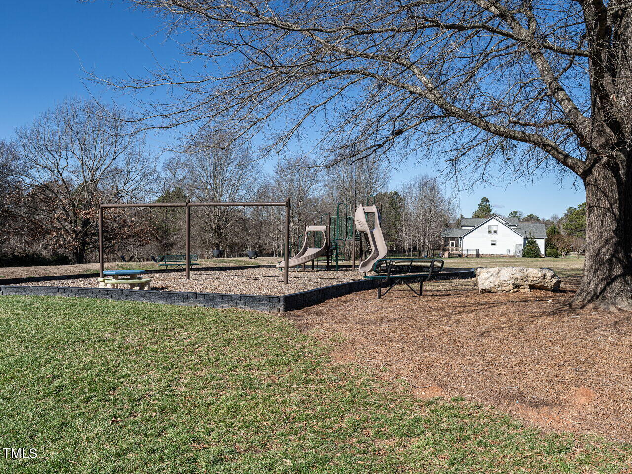 1173 Smith Creek Way Wake Forest, NC 27587 - Photo 42 of 42 a view of a backyard with wooden fence