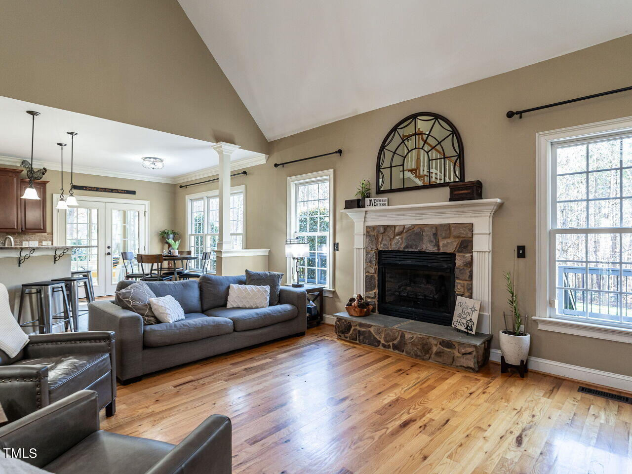 1173 Smith Creek Way Wake Forest, NC 27587 - Photo 8 of 42 a living room with furniture and a fireplace