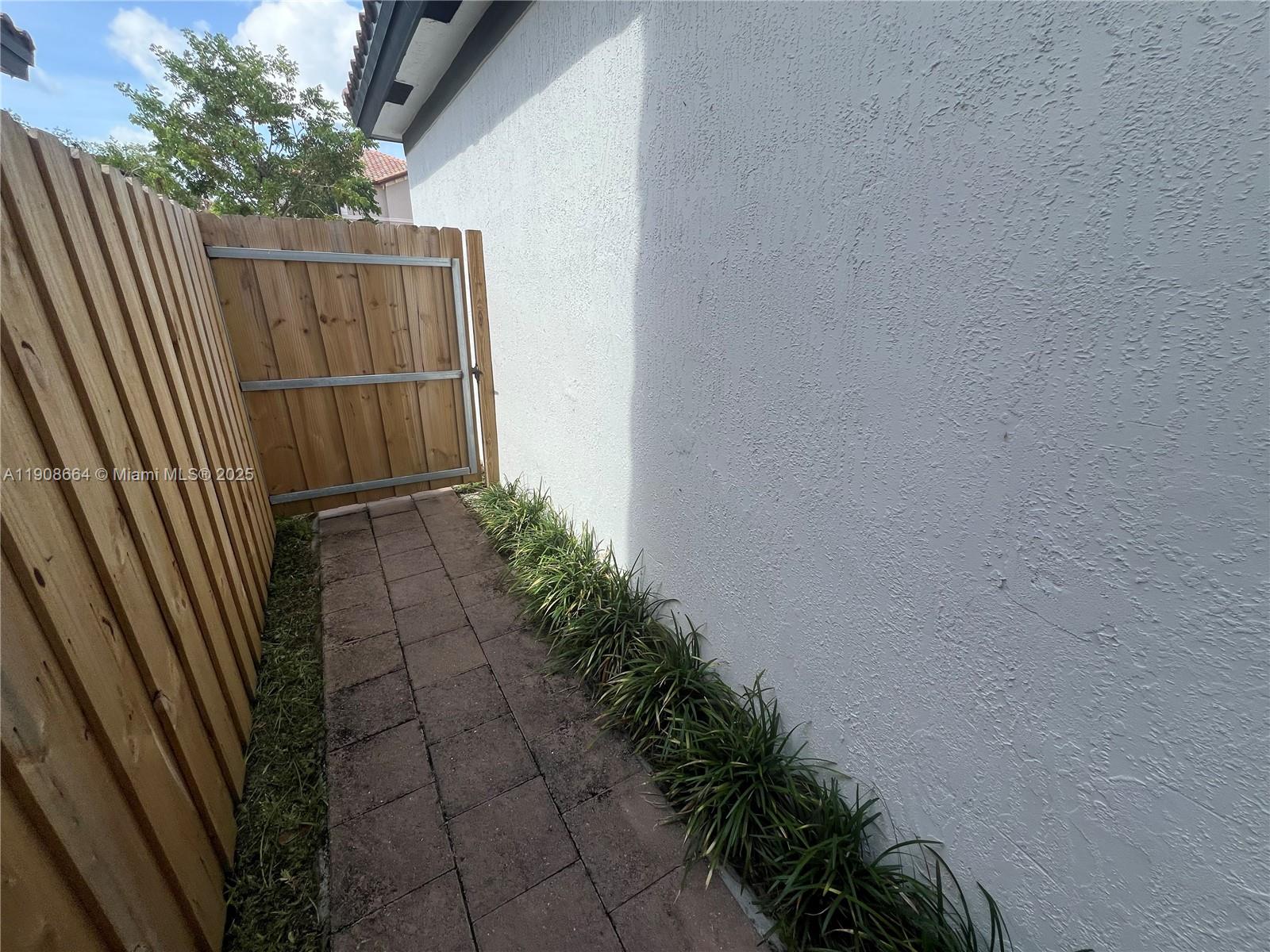 11751 Southwest 248th Terrace Homestead, FL 33032 - Photo 13 of 14 a view of a backyard