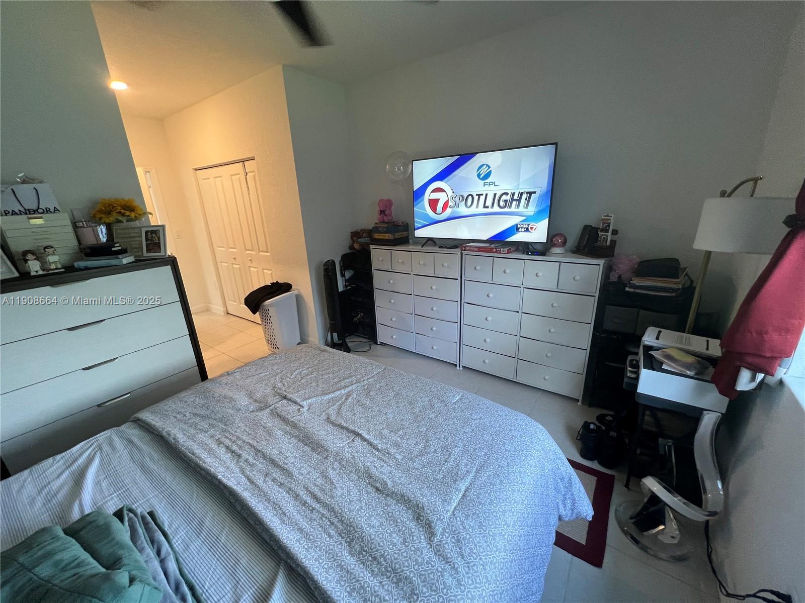 11751 Southwest 248th Terrace Homestead, FL 33032 - Photo 9 of 14 a bedroom with a bed and furniture