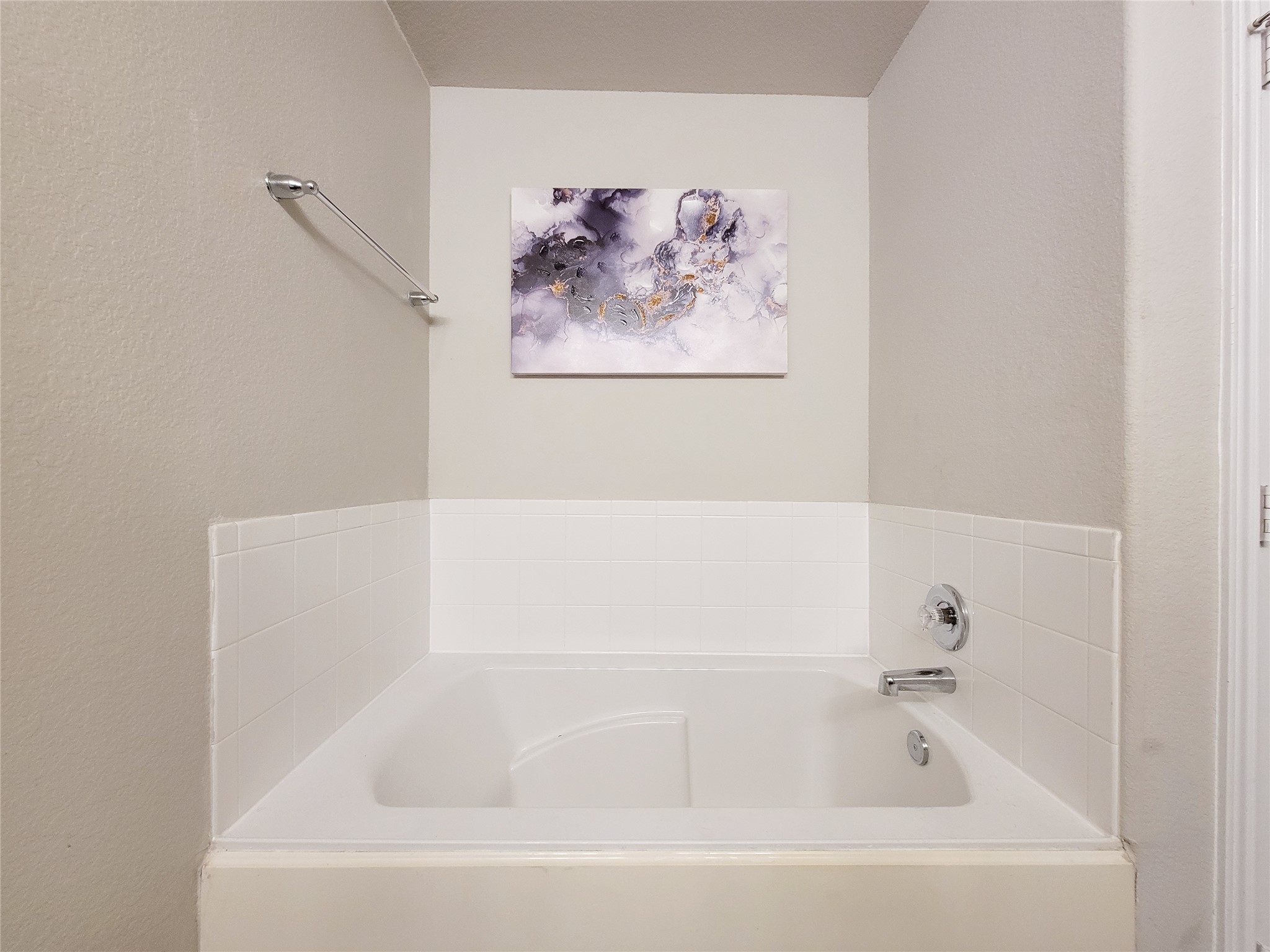 8003 Ecru Lane Rosharon, TX 77583 - Photo 32 of 43 a white bath tub sitting in a bathroom