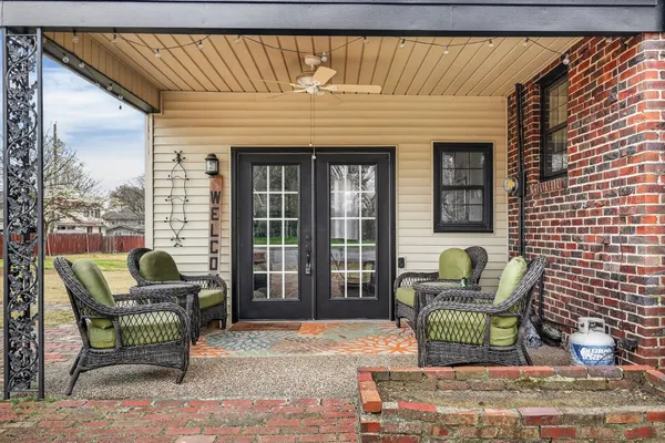 a building outdoor space with patio furniture