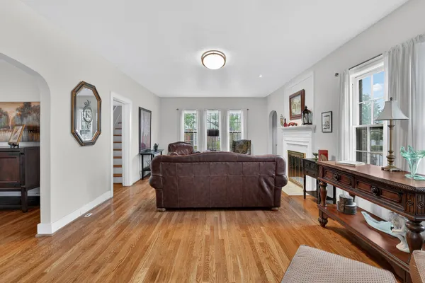 a living room with a couch and a large window