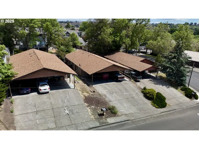 a black and white photo of a street