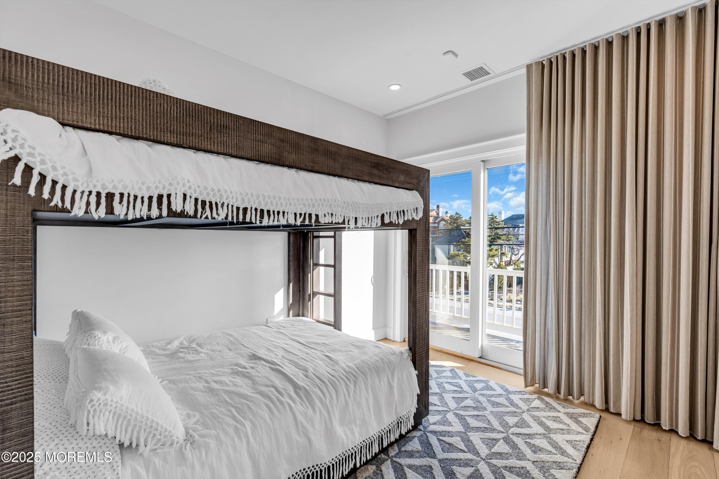 135 Highway 35 Mantoloking, NJ 08738 - Photo 15 of 36 a bedroom with a bed and a window