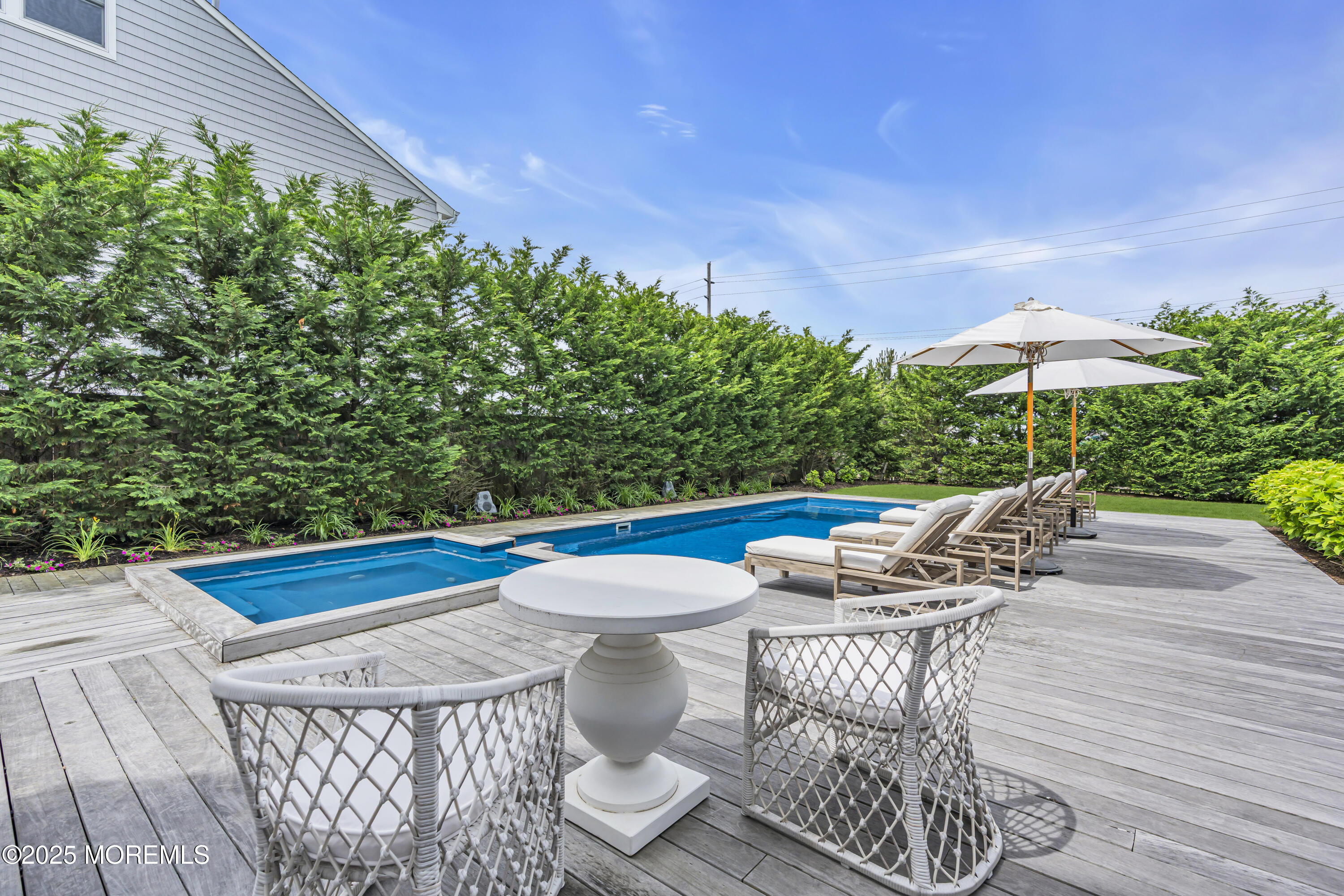 135 Highway 35 Mantoloking, NJ 08738 - Photo 25 of 36 a view of outdoor sitting area with furniture and wooden floor