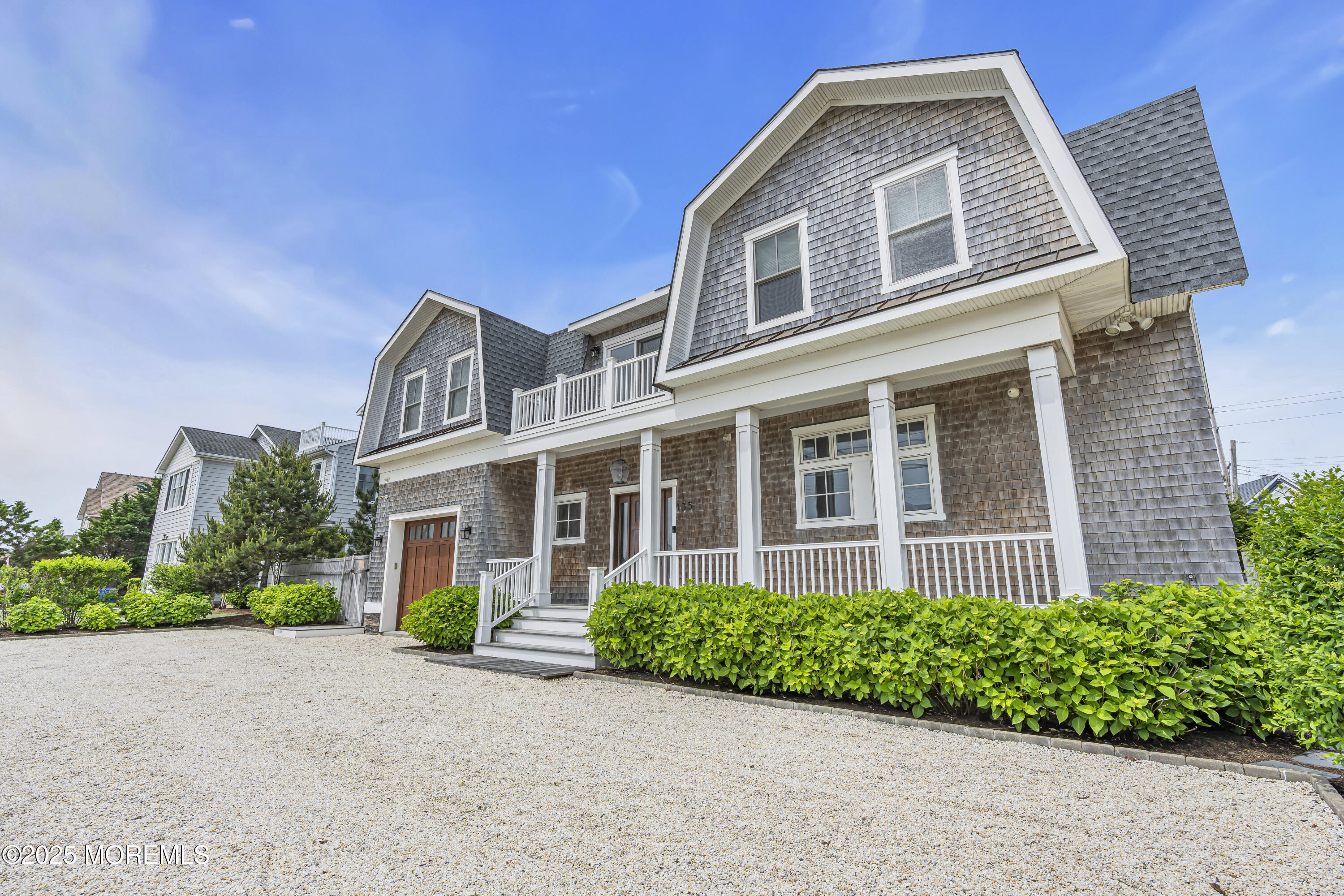 135 Highway 35 Mantoloking, NJ 08738 - Photo 35 of 36 a front view of a house with a yard