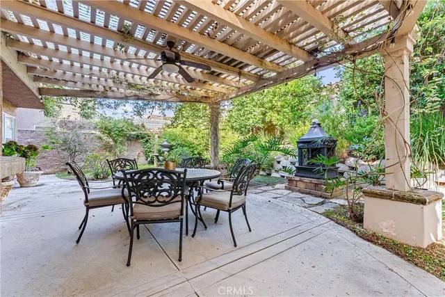 an aerial view of residential houses with outdoor space and river