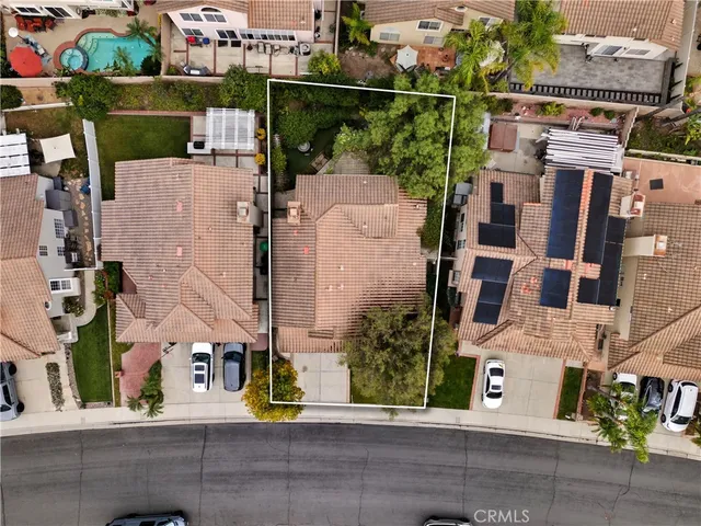 a view of a back yard of the house and front of a house