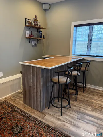 a room with a table and chairs