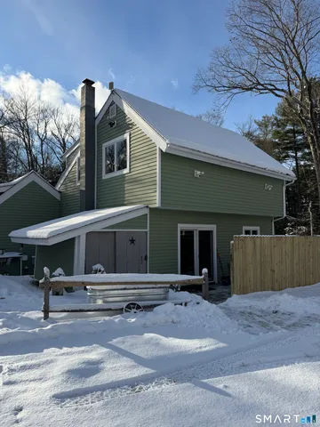 a front view of a house with garage