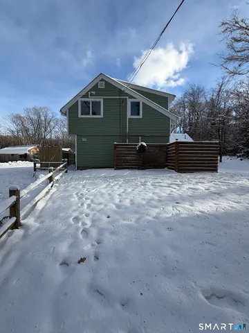 a house view with a outdoor space
