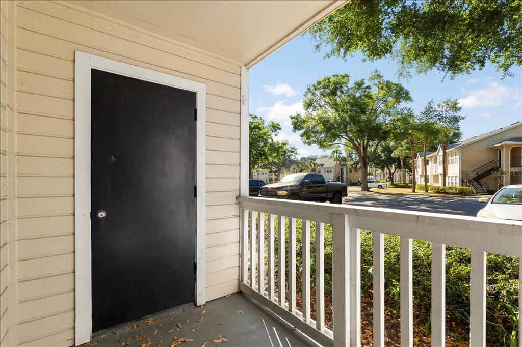 1063 South Hiawassee Road, Unit 1615 Orlando, FL 32835 - Photo 14 of 20 a view of a street from a balcony