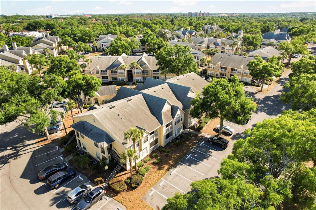 1063 South Hiawassee Road, Unit 1615 Orlando, FL 32835 - Photo 18 of 20 an aerial view of a house with yard