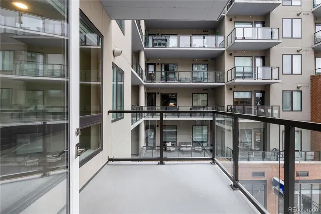 a view of building with a balcony