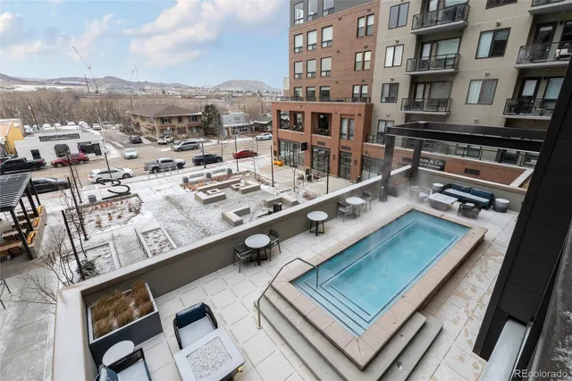 a view of balcony with furniture