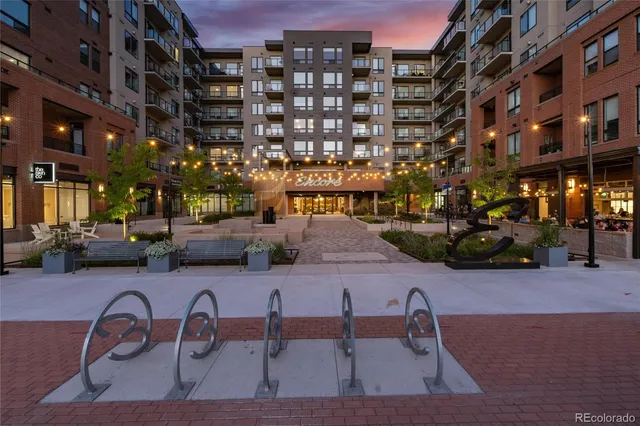 a view of a building with sitting area