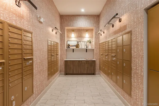 a bathroom with a mirror and a shower
