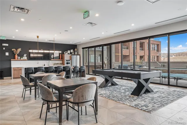 a view of a dining room with furniture window and outside view