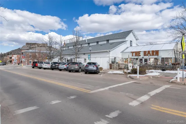 a view of street with cars